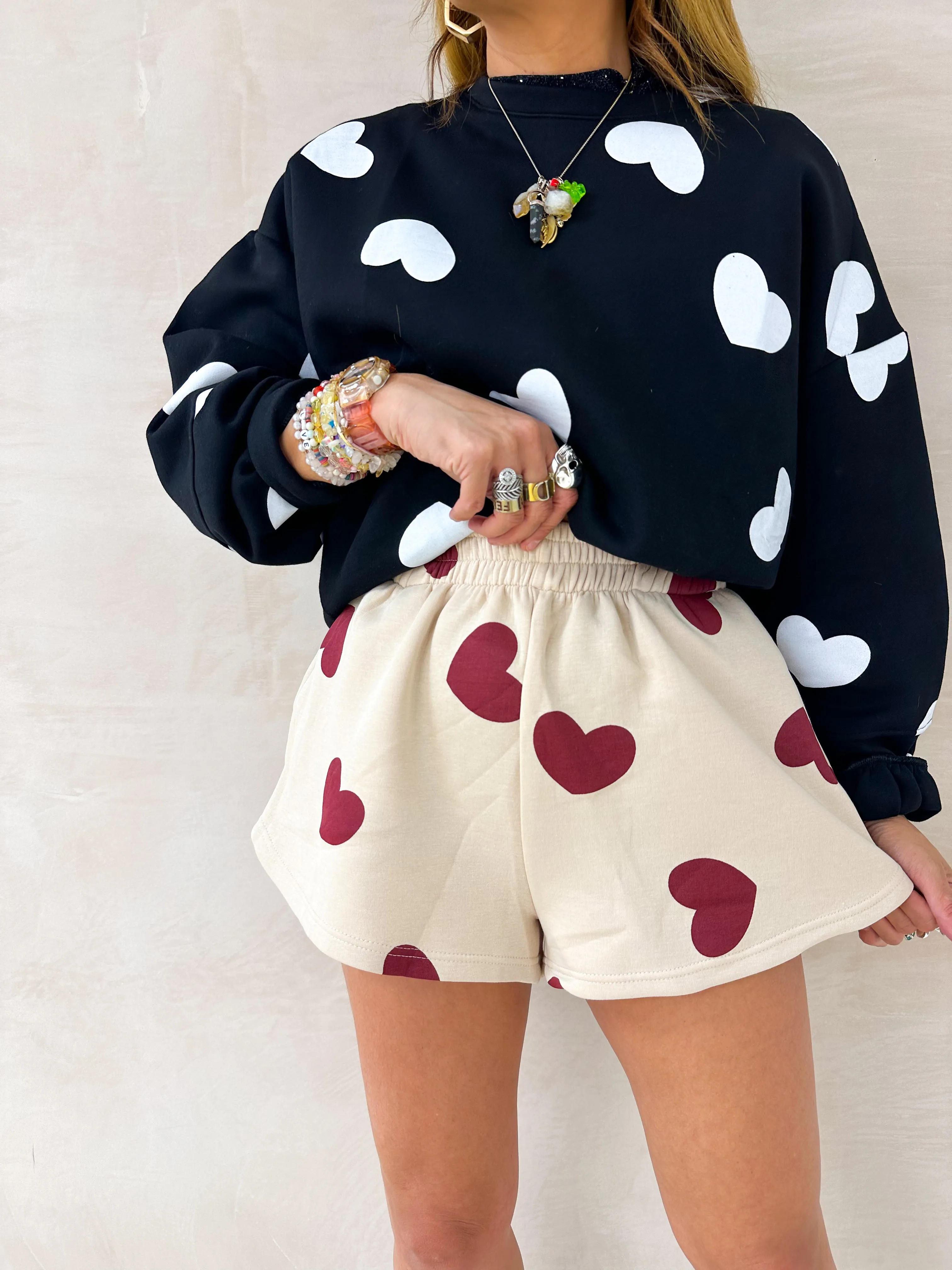 All Over Scattered Heart Sweatshirt In Black