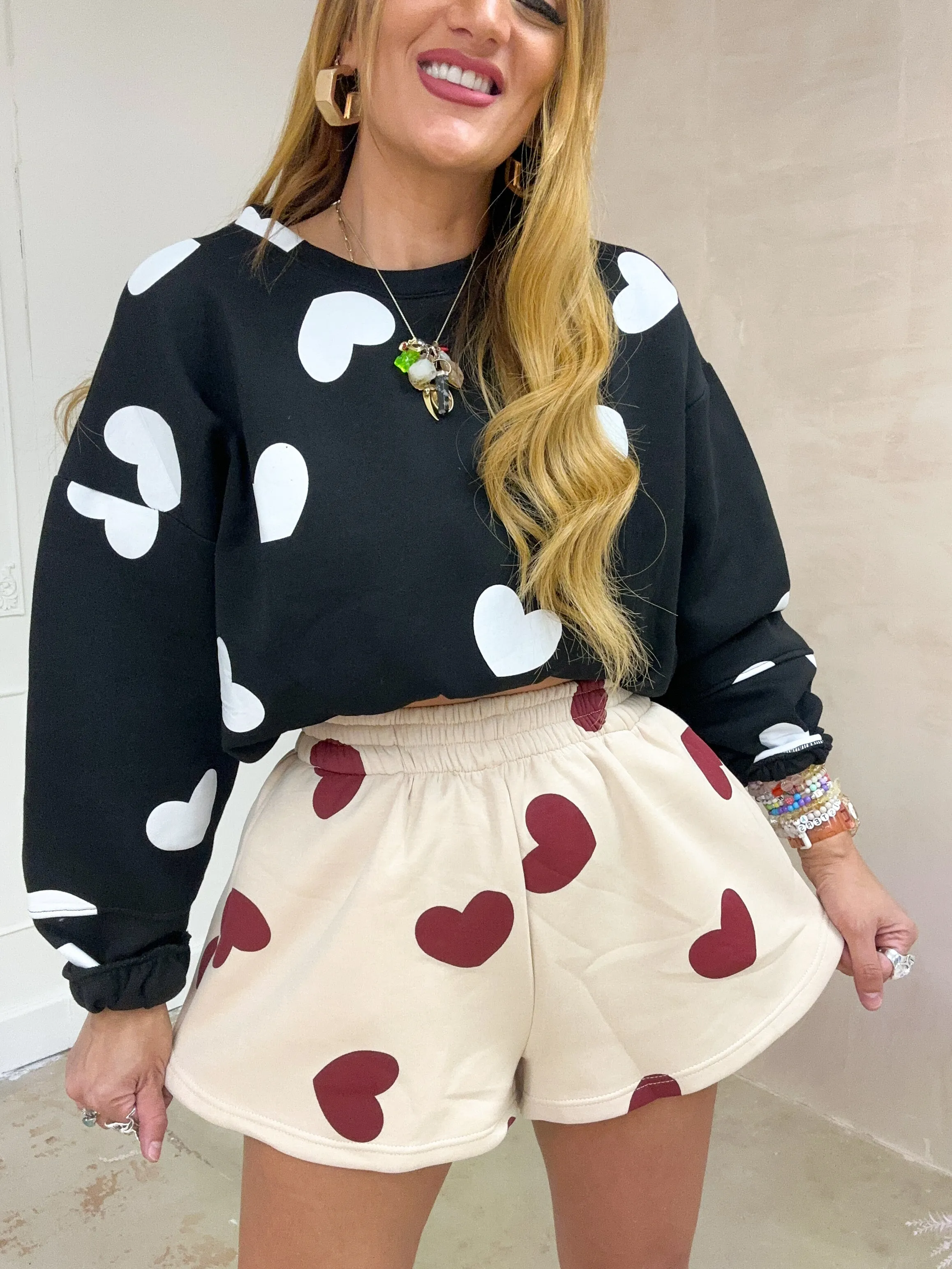 All Over Scattered Heart Sweatshirt In Black